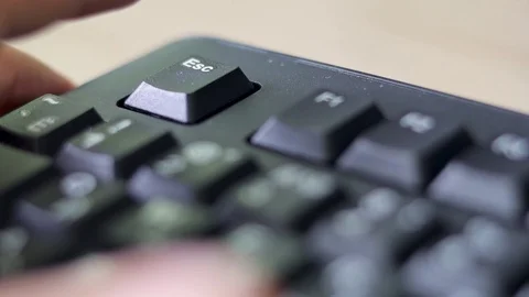 Pressing ESC on the keyboard Vídeo Stock 115525165