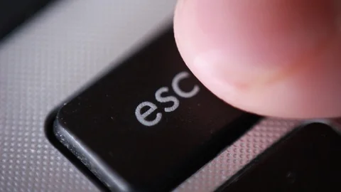 Pressing Escape button on notebook. Macro focus Stock Footage 87971209