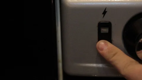 Pressing the Ignition Button on a Gas Oven Stock Footage 85991521