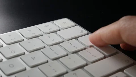 Pressing the keyboard key 库存影片 128315893