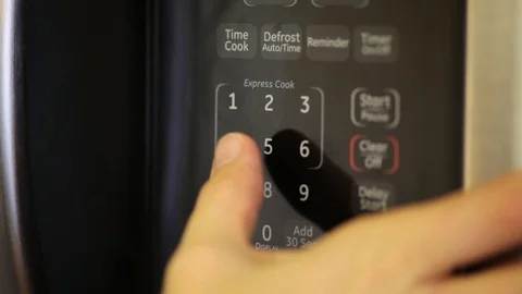 Pressing Microwave Buttons In Household Kitchen Stock-Footage 88712702