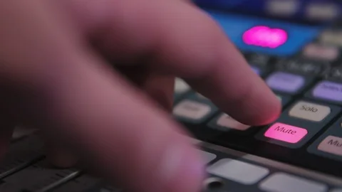Pressing the mute button on an audio mixing board Video stock 89501934