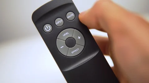 Pressing mute button on hifi remote control Stock Footage 91985989