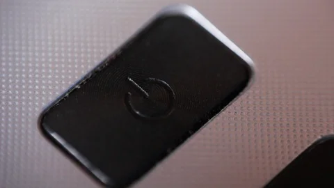 Pressing notebook power button. Macro focus Stock Footage 87971278