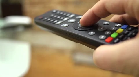 Pressing OK button on the TV remote control Stock Footage 46018546
