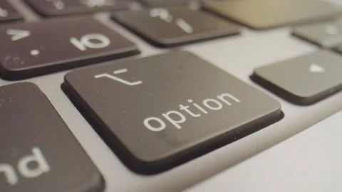 Pressing the options key. Macro Stock Footage 170069522