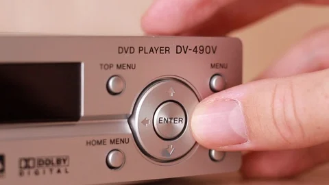 Pressing panel buttons on DVD player Stock Footage 88245041