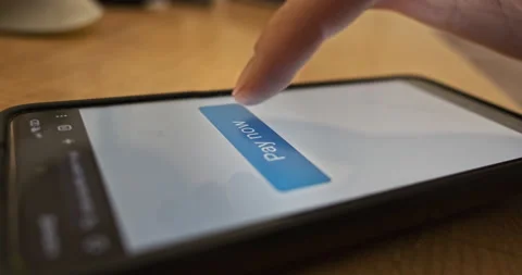 Pressing the Pay Now button on the smartphone screen. Order confirmed, response 스톡 동영상 263477645