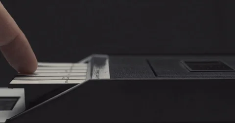 Pressing play button on retro audio cassette tape player recorder Stock Footage 121188652