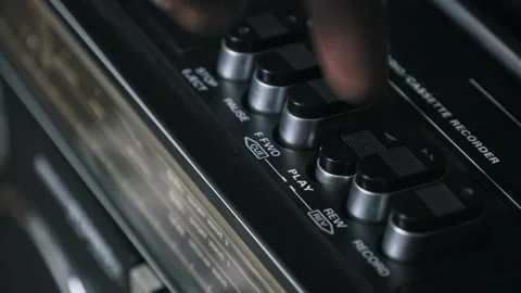 Pressing Play Button on Retro Tape Player Stock Footage 317913710