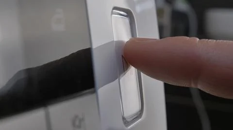 Pressing Play Pause Button on the Device Multiple Times Close-Up Stock Photos