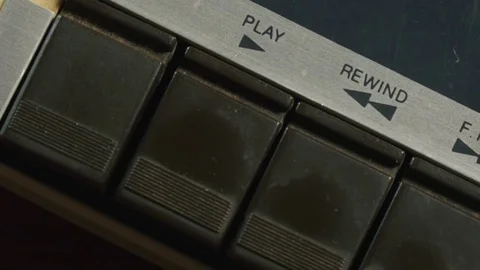 Pressing play switch on an old tape player Stock Footage 78140249