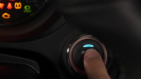 Pressing The Power Button Of a Car To Start The Engine Closeup Stock Footage 135099117