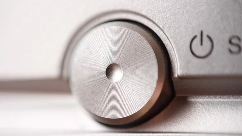 Pressing power button on metallic device. Macro focus Stock Footage 88245064