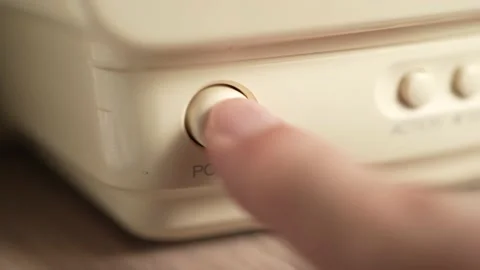 Pressing The Power Button on a White Device Closeup Stock Footage 161070617