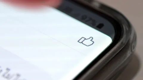 Pressing like reaction to Facebook post. Stock Footage 158370324