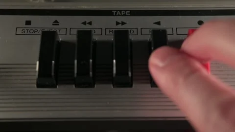 Pressing record on an audio cassette tape recorder Stock Footage 272482542