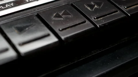 Pressing Rewind Button On An Old Black Cassette Tape Recorder. Stock Footage 147875483