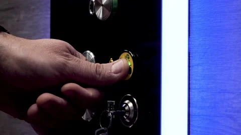 Pressing security alarm button on elevator panel male hand, Handheld Stock Footage 169281896
