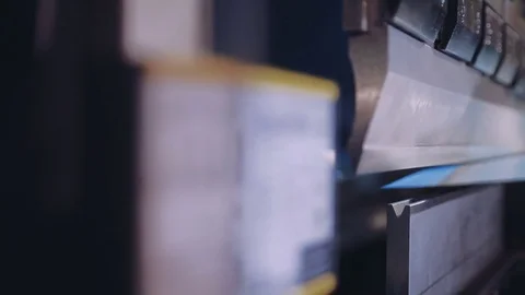 Pressing sheet metal on a machine tool factory. Closeup Stock Footage 73470492