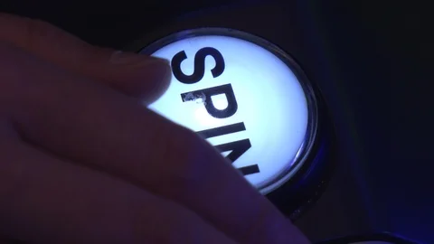 Pressing spin button on casino slot machine 4k Stock Footage 110890327