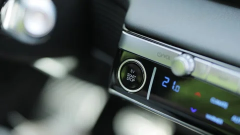 Pressing Stand By Power Button To Turn On and Off the Electric Car Close-Up Stock Footage 272310950