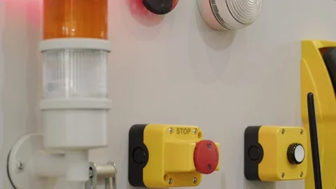 Pressing start and stop buttons on manufacture, blinker unit Stock Footage 105102839