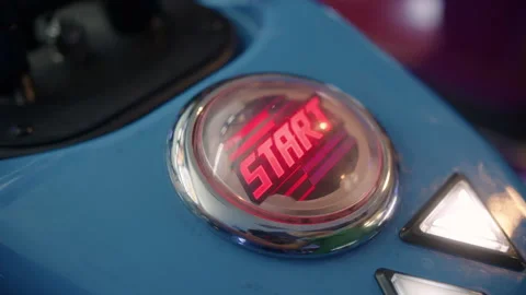 Pressing start in the arcade Stock Footage 252734806