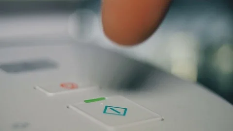 Pressing of the START-UP button in the printer Stock Footage 81787155
