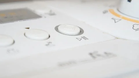Pressing the start button on the washing machine Stock Footage 88269366