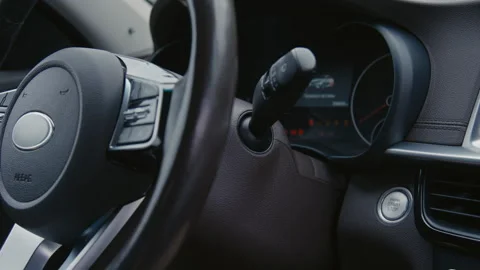 Pressing Start Engine Button in Auto Stock Footage 255367947