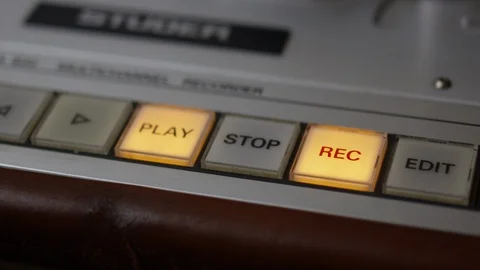 Pressing stop button on recording studio tape deck Stock Footage 107027961