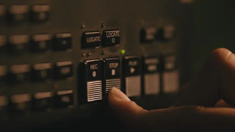 Pressing stop on tape recorder Stock Footage 275713046