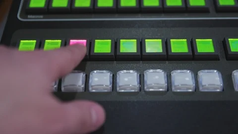 Pressing a studio switching console button in a control room Video stock 89503084