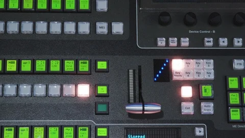 Pressing a studio switching console button in a control room Stock Footage 89580510