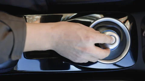 Pressing Switch Button On Automobile Console. Man Driver Using Parking Button Stock Footage 196001917