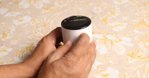 Pressing sync button on wireless security camera close up. Stock Footage 322098454