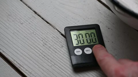 Pressing a timer's start button, countdown from 30 minutes, close-up Stock Footage 243859164
