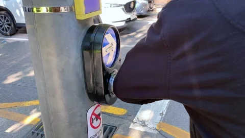 Pressing a traffic light with the elbow Stock Footage 136564842