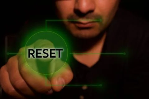 By pressing the virtual reset button Stock Photos