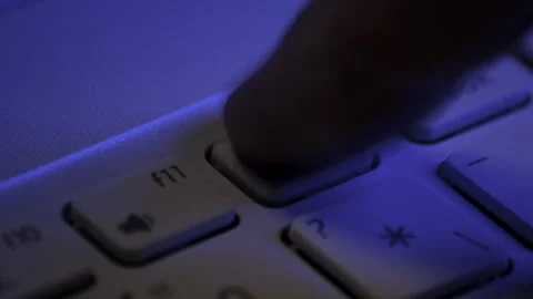 Pressing the Volume Up Key on the Keyboard Video stock 323445593