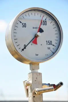 The pressure dial gauge installed on oil line Stock Photos