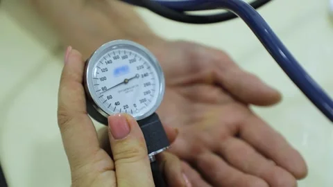 Pressure gauge on doctor's hands Stock Footage 245414895