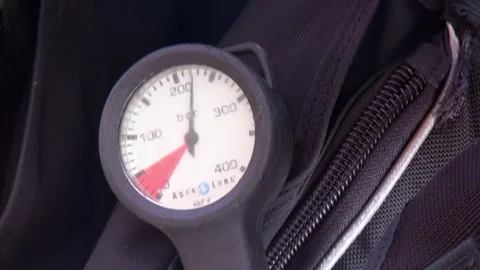 Pressure gauge is element of professional diving equipment. Stock Footage 263836607
