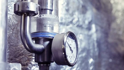 Pressure gauge mounted on a beer fermentation tank. Stock Footage 123400215