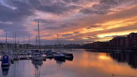 PRESTON Docks, UK 2025 March 03; Spring  reflections of moored yachts 4k video Stock Footage 303334388