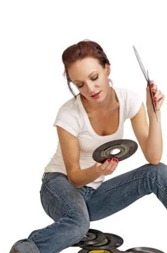 Prett Redhead Choosing A Record Foto stock