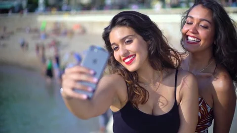 Pretty Arab / middle eastern girls taking selfies Stock Footage 78365952