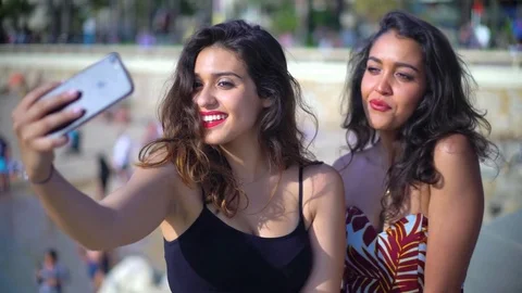 Pretty Arab / middle eastern girls taking selfies Stock Footage 78366093