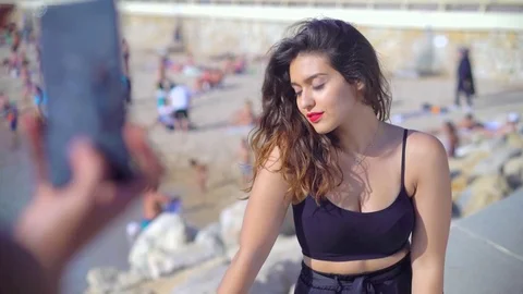Pretty Arab / middle eastern girls taking photos of each other Stock Footage 78366257